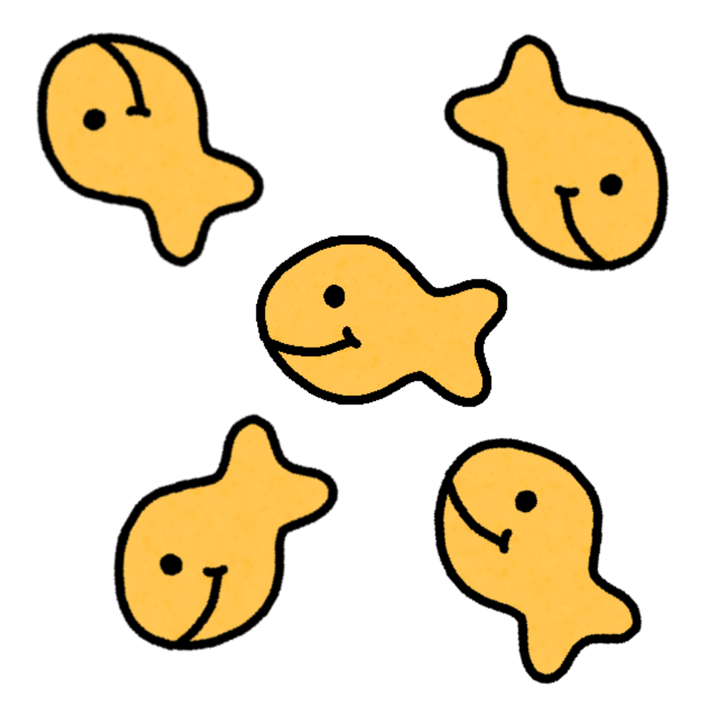 five fish-shaped orange crackers, all facing different directions.